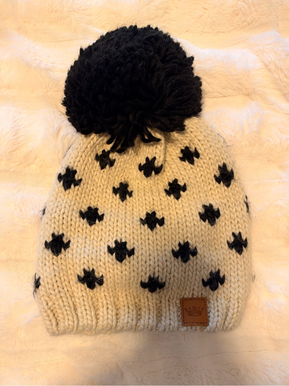 Fleur de Lis Collection Cream Knit Beanie with Black Pom